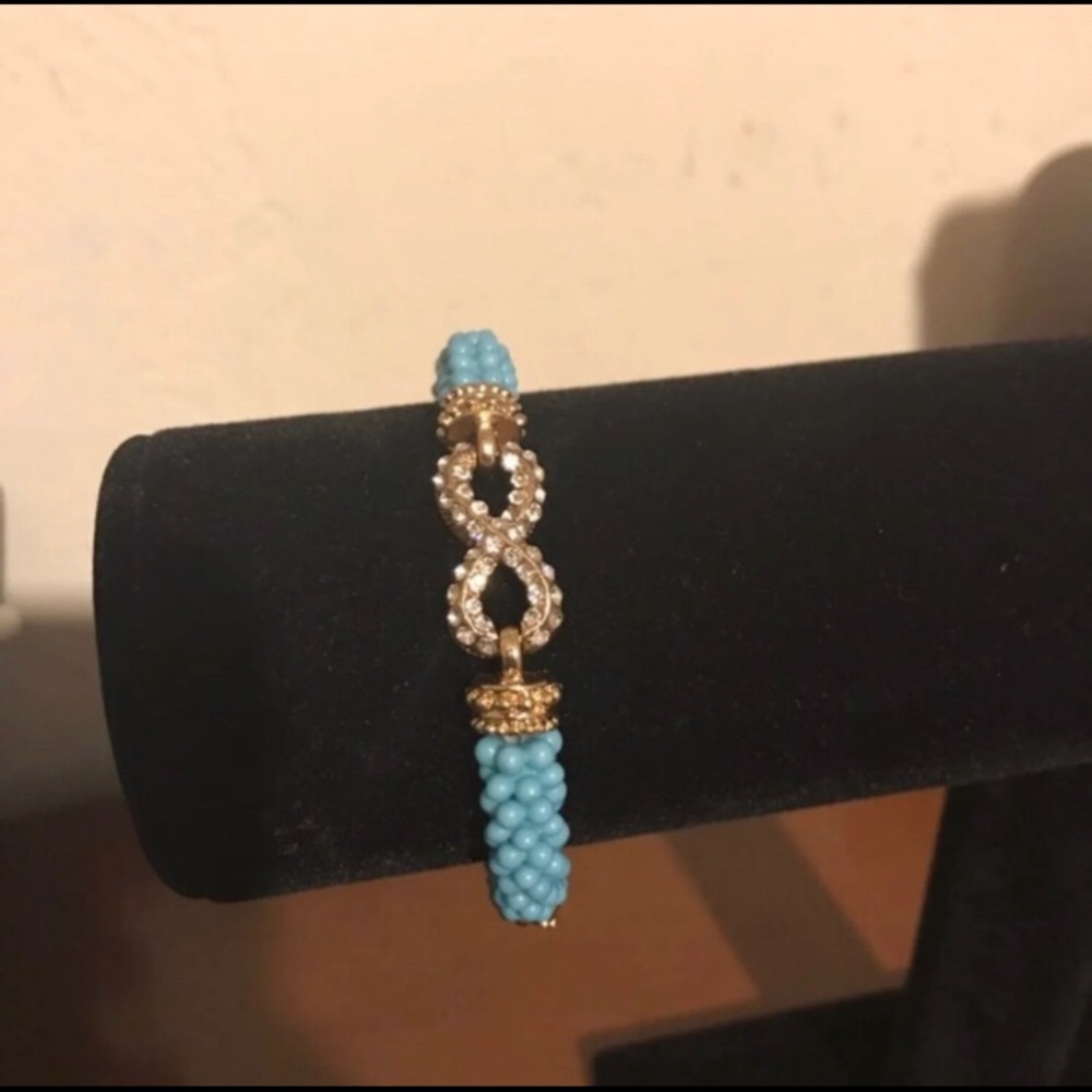 Blue and gold infinity bracelet